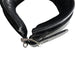 Close-up of black padded leather collar with silver buckle and three D-rings for adjustable attachments.