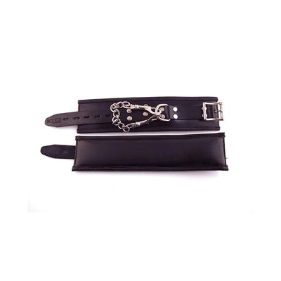 Black padded leather wrist cuffs with adjustable buckle straps and detachable silver chain with trigger hooks.