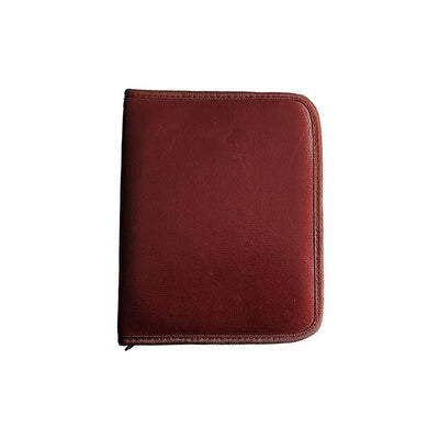 Closed burgundy leather case for Rouge Stainless Steel Thin Collar with zipper edge.