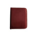 Closed burgundy leather case for Rouge Stainless Steel Thin Collar with zipper edge.