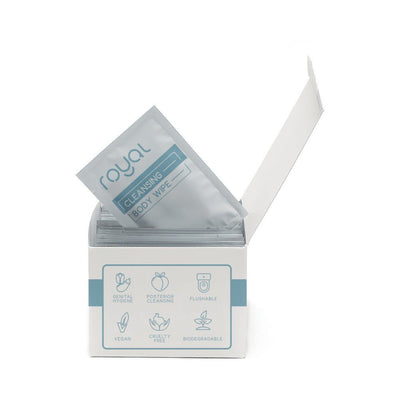 Box of Royal Condom Intimacy Cleansing Wipes with one individually wrapped wipe partially pulled out, showing eco-friendly and vegan icons.