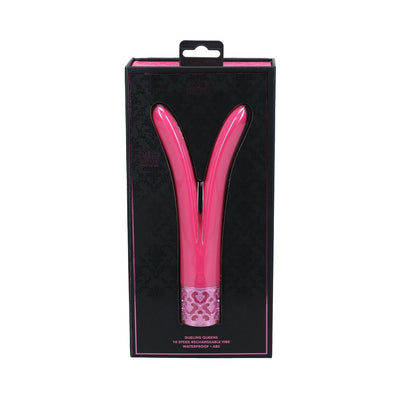 Pink dual-prong silicone vibrator in black and pink packaging with decorative base and 10-speed rechargeable feature.