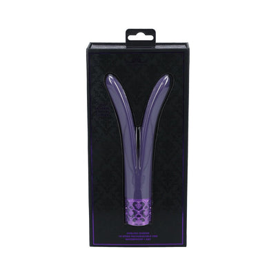 Purple V-shaped silicone vibrator with decorative base in black and purple packaging box.