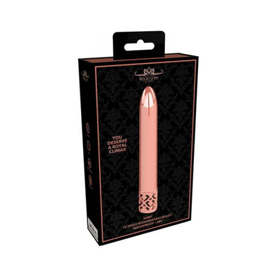 Rose gold rechargeable bullet vibrator with decorative base displayed on black patterned packaging box.