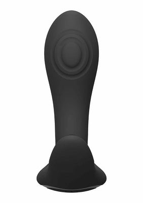 Black silicone dual-stimulation vibrator with textured surface and ergonomic curved design.