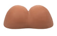 Brown life-size realistic textured stroker toy shaped like a pair of smooth, rounded buttocks.