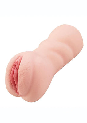 Compact realistic textured masturbator in soft skin tone designed for discreet travel pleasure.