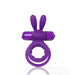 Purple double ring cockring with flexible rabbit ears and attached bullet vibrator on a white background.
