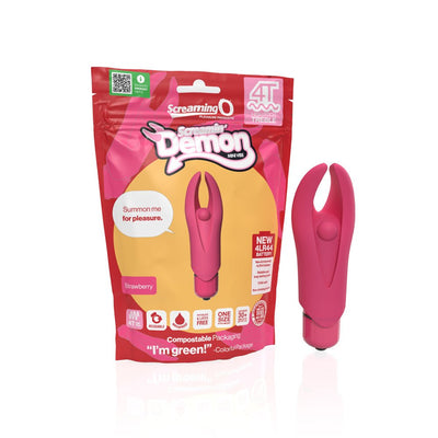 Screaming O 4T Demon mini vibrator in strawberry pink with flexible horns next to eco-friendly compostable packaging.