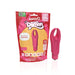 Screaming O 4T Demon mini vibrator in strawberry pink with flexible horns next to eco-friendly compostable packaging.