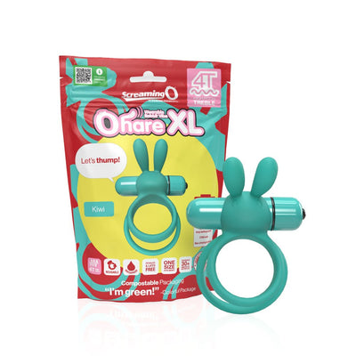 Teal Screaming O Ohare XL wearable rabbit-style vibrating ring with eco-friendly packaging in the background.