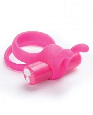 Pink wearable rabbit vibrator ring with dual motors and flexible silicone ears for targeted stimulation.