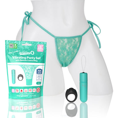 Teal lace side-tie panty displayed on mannequin with matching vibrating bullet, remote control ring, and product packaging.