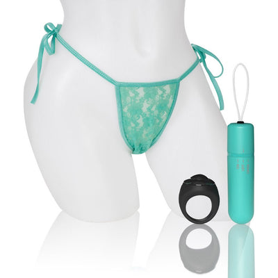 Turquoise lace side-tie panty with matching vibrating bullet and black ring-style remote control on white mannequin.