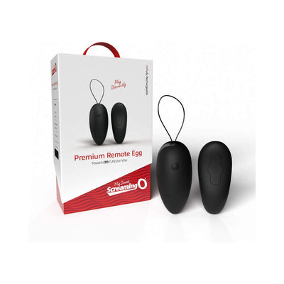 Black Screaming O Premium Remote Control Vibrating Egg with matching remote and packaging box on white background.