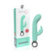 Mint green Screaming O Primo Rabbit vibrator with ergonomic handle and flexible rabbit ears next to its packaging box.