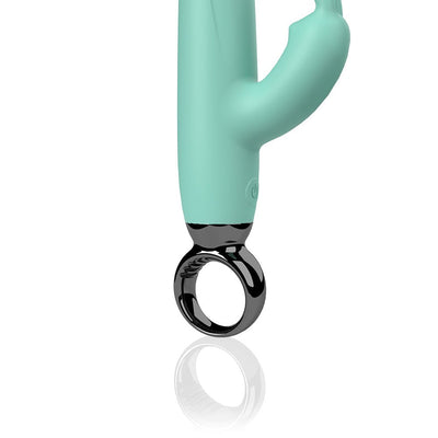 Close-up of the mint green Screaming O Primo Rabbit vibrator with flexible rabbit ears and black circular handle on a white background.