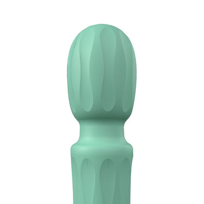 Close-up of the textured mint green silicone head of the Screaming O Primo Wand vibrator.