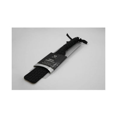 Black Sei Mio Tyre Paddle Large with textured tire tread pattern and smooth handle, packaged with label on a white background.