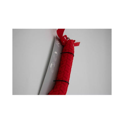 Close-up of the red Sei Mio Tyre Paddle with textured surface and attached product tag.