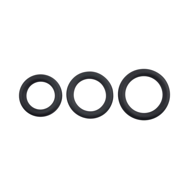 Set of three black silicone cock rings in small, medium, and large sizes arranged side by side on white background.