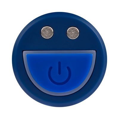 Close-up of blue circular power button with smiley face design on Selopa Cobolt Cutie mini vibrator.