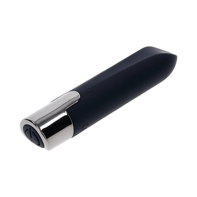Compact black silicone bullet vibrator with chrome-finished base and curved tip for targeted stimulation.