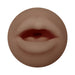 Close-up of a dark-toned lifelike oral stroker with detailed lips design.