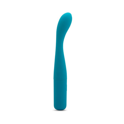 Teal flexible G-spot vibrator with curved tip and smooth silicone finish, standing upright on white background.