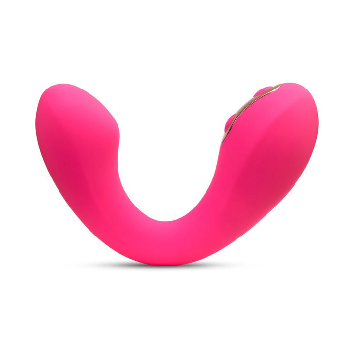 Bright pink flexible G-spot vibrator with ergonomic curved design and control buttons on one end.