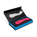 Pink curved silicone single tap vibrator in black and blue gift box with molded insert.