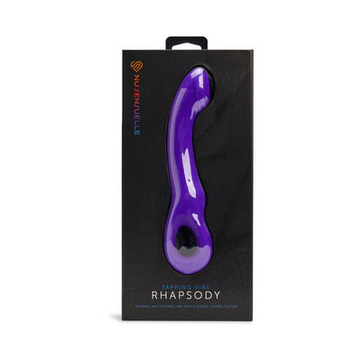Purple curved tapping vibrator in black retail packaging with clear window showing the product inside.