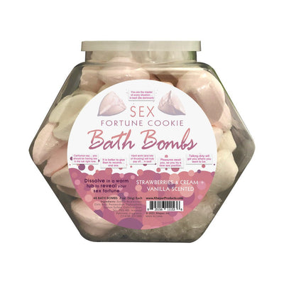 Clear fishbowl container filled with pink and white sex fortune cookie bath bombs, strawberries and cream scented.