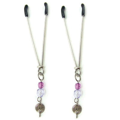 Pair of adjustable silver tweezer clamps with black tips and purple swirl charm accents on a white background.