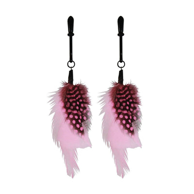 Pair of black nipple clamps adorned with soft pink and black spotted feathers for playful sensory teasing.