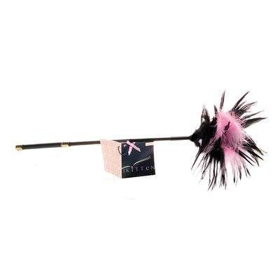 Soft pink and black feather tickler with a slender black handle and decorative tag attached.