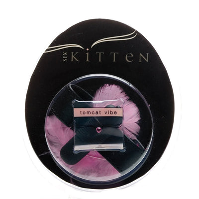 Sex Kitten TomCat adjustable black leather vibrating ring with pink feather accents in round black packaging