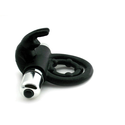 Black silicone vibrating dual ring with rabbit ear stimulator and silver bullet vibrator on white background