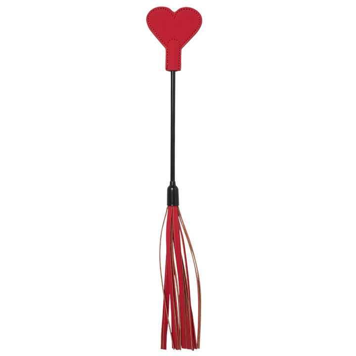 Red heart-shaped handle crop with soft faux leather tassels for playful sensation and style.