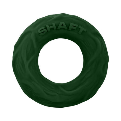 Small dark green flexible silicone C-ring with textured surface and SHAFT branding embossed on top.