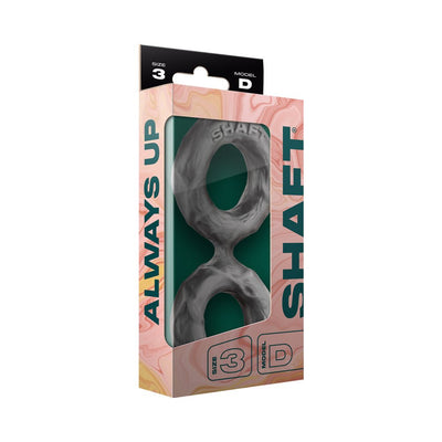 Shaft Model D double C-ring in large size, made of flexible silicone, displayed in peach and green packaging.