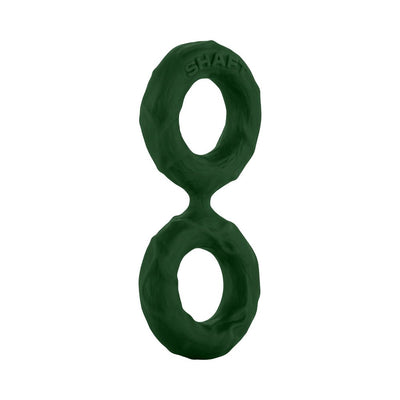 Dark green double C-ring made of flexible silicone with textured surface and embossed Shaft branding.