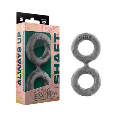 Medium size Shaft Double C-ring in gray liquid silicone with textured surface, shown with packaging box.