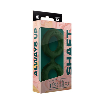 Shaft Double C-ring Medium in green liquid silicone displayed in pink marbled packaging with size 2 and model D labels.