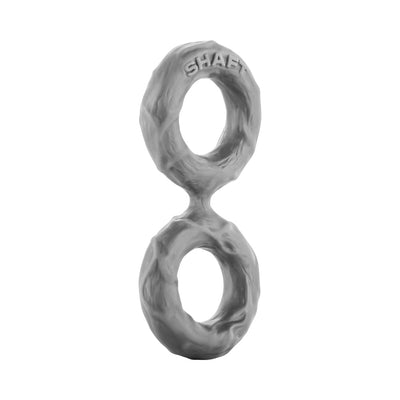 Small double C-ring made of textured gray silicone with Shaft branding on top ring.