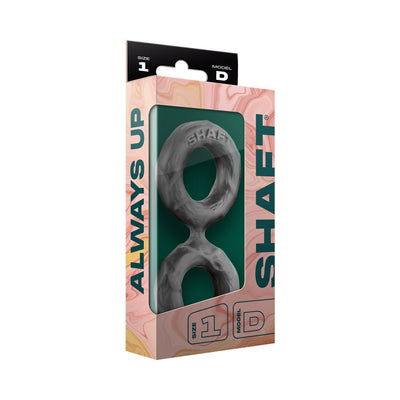 Shaft Double C-ring Model D in small size, black flexible silicone accessory in retail packaging with pink and green design.
