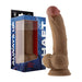 Realistic dual-density silicone dildo with balls and suction cup in oak color, displayed next to its blue packaging box.