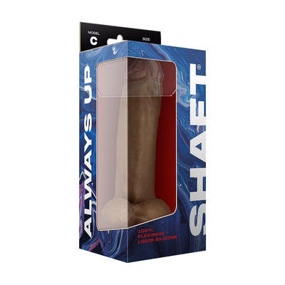Shaft Model C 9.5 inch dual density silicone dildo in oak color with balls and suction cup in branded packaging.