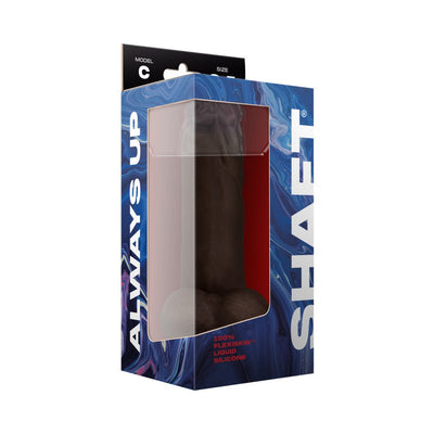 Packaging box of Shaft Model C realistic dildo in mahogany color with blue and white design and clear window display.