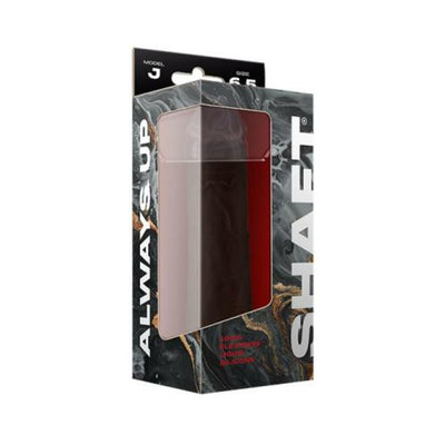 Packaging box of Shaft Model J 6.5 inch liquid silicone dildo with black and marbled design and clear window display.